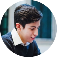 concentrated-young-male-student-reading-200x200